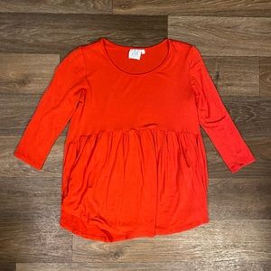 Red blouse from The Mint Julep Boutique